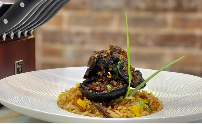How to Prepare Spicy African Giant Snails with Coconut Rice