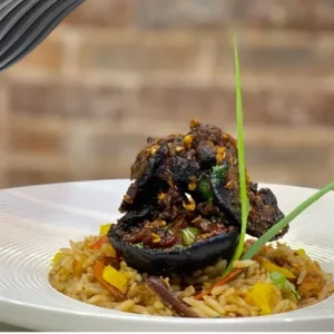 How to Prepare Spicy African Giant Snails with Coconut Rice